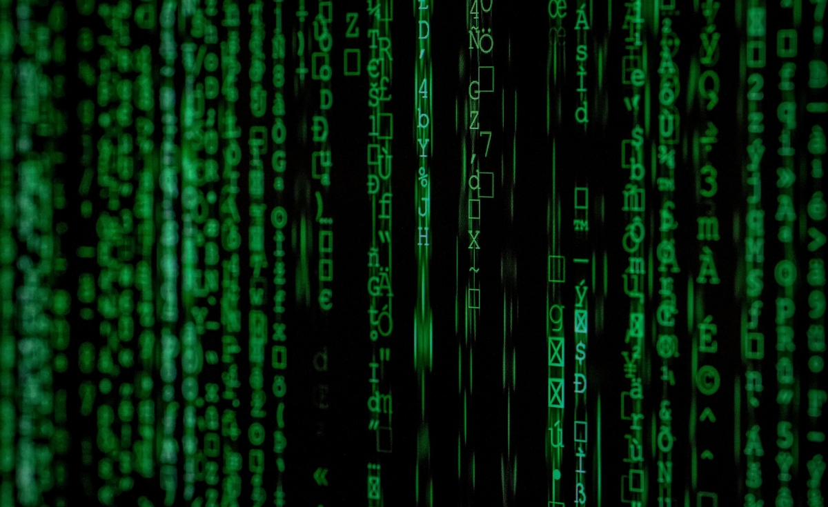 Green digital rain of computer code cascading down a black screen, symbolizing the Sri Lankan Great Firewall.